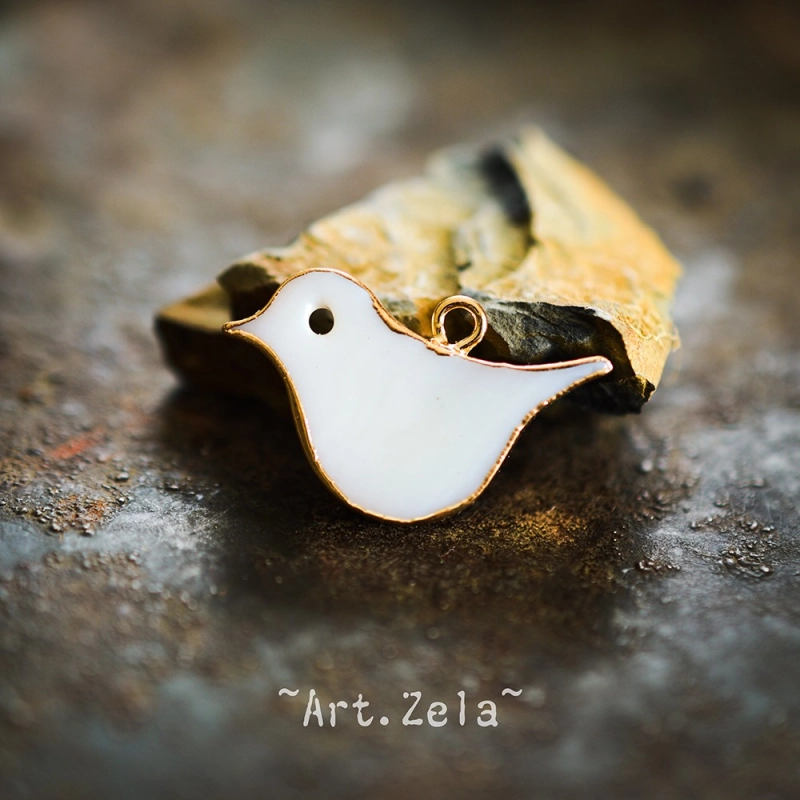 Pendentif oiseau nacre naturelle 25x16.5 mm X1 Pendentif laiton et nacre