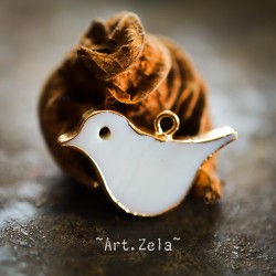 Pendentif oiseau nacre naturelle 25x16.5 mm X1 Pendentif laiton et nacre