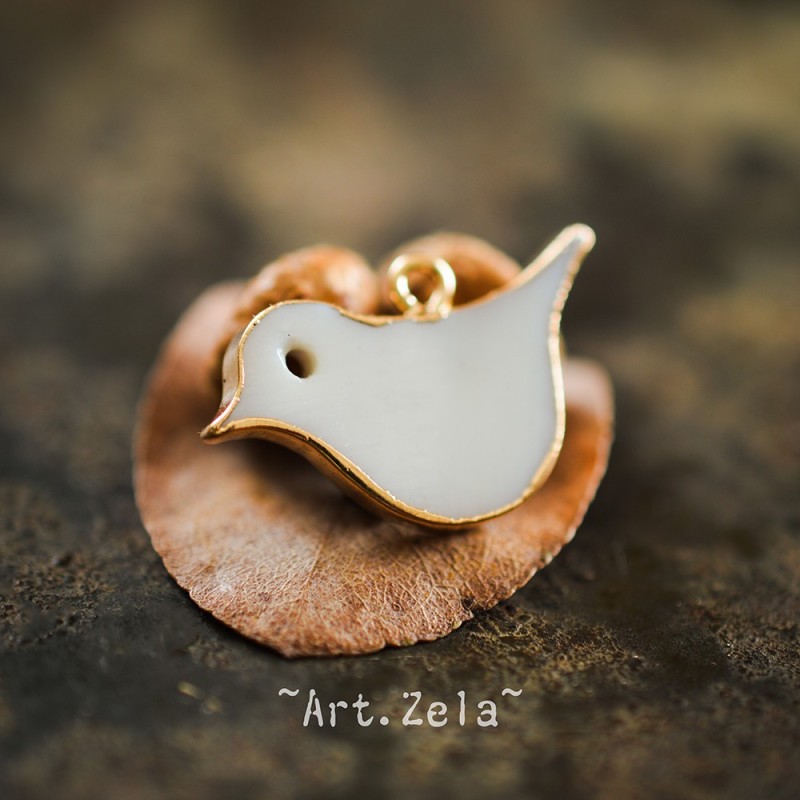 Pendentif oiseau nacre naturelle 25x16.5 mm X1 Pendentif laiton et nacre