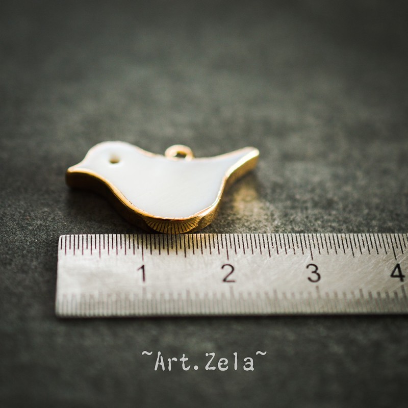 Pendentif oiseau nacre naturelle 25x16.5 mm X1 Pendentif laiton et nacre