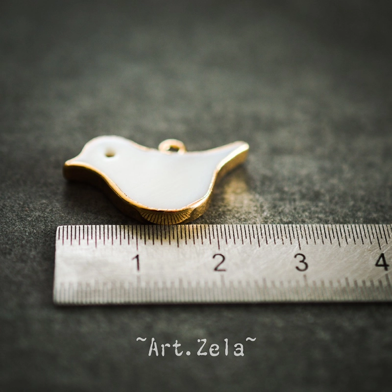 Pendentif oiseau nacre naturelle 25x16.5 mm X1 Pendentif laiton et nacre