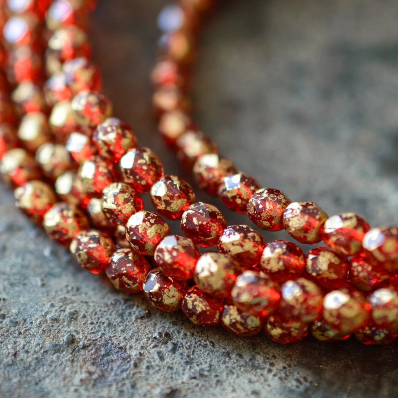Facettes rouge rubis doré 4mm X50 Perles verre tchèque transparent