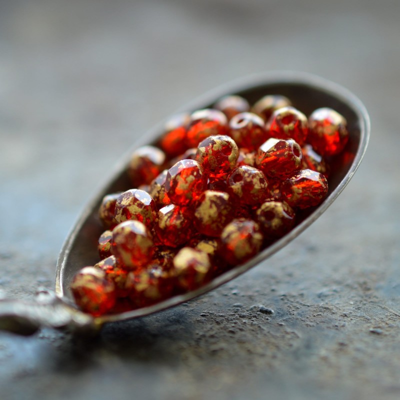Facettes rouge rubis doré 4mm X50 Perles verre tchèque transparent