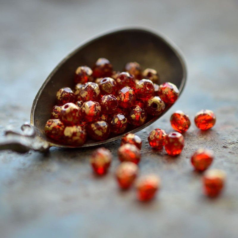 Facettes rouge rubis doré 4mm X50 Perles verre tchèque transparent