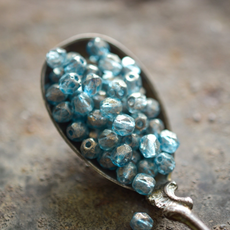 Facettes bleu doré 4mm X40 Perles verre tchèque transparent