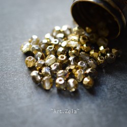 Perles facettes transparentes doré 4mm X40 Perles verre tchèque premium