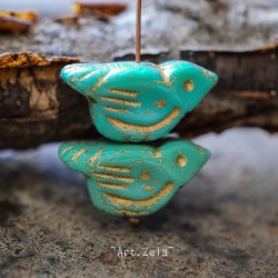 Oiseau turquoise doré 22mm X1 Perle verre tchèque opaque