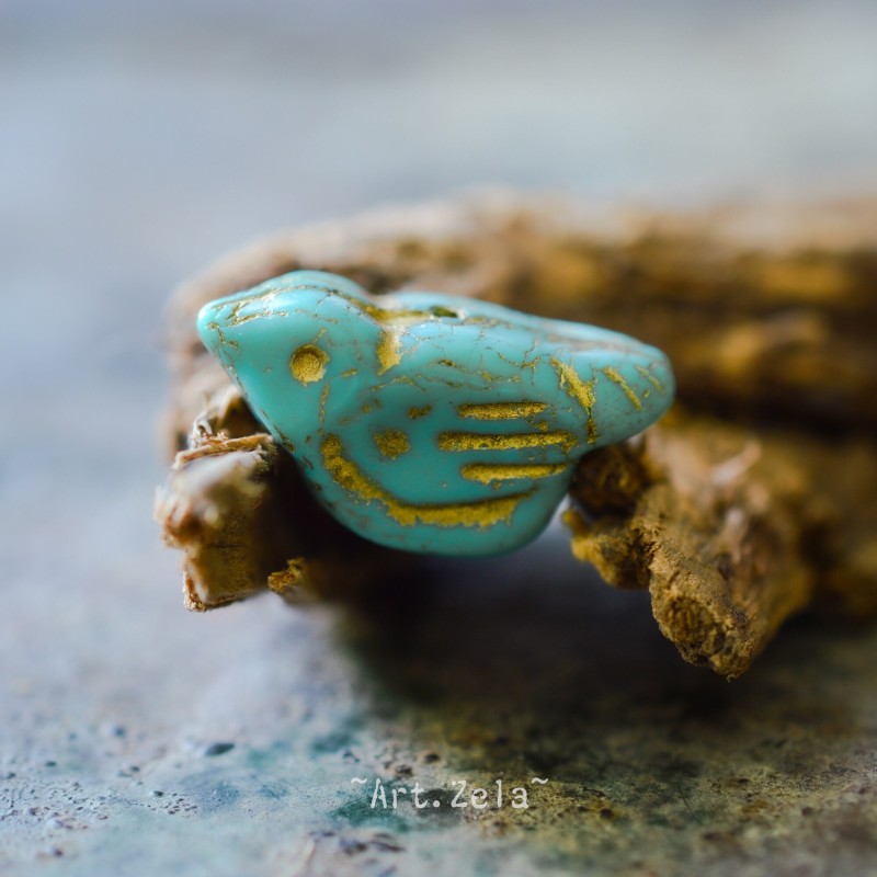 Oiseau turquoise doré 22mm X1 Perle verre tchèque opaque