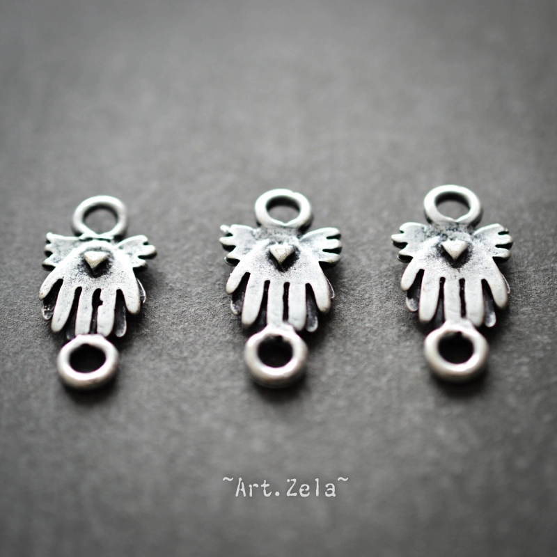 Connecteurs mains ailées 22mm X10 Métal rustique argenté antique