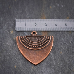 Pendentif cuivré style ethnique 35mm X1 Métal orné de petits motifs