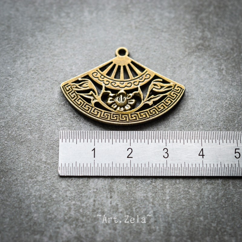 Pendentif éventail ajouré 36mm X2 Pendentifs métal ton bronze