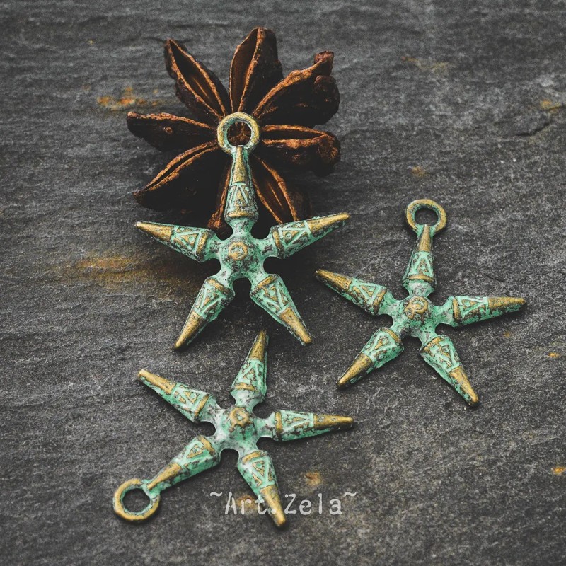 Breloque étoile de mer stylisée 2,8mm X4 Métal bronze patiné