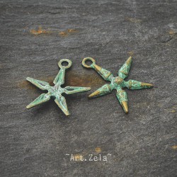 Breloque étoile de mer stylisée 2,8mm X4 Métal bronze patiné