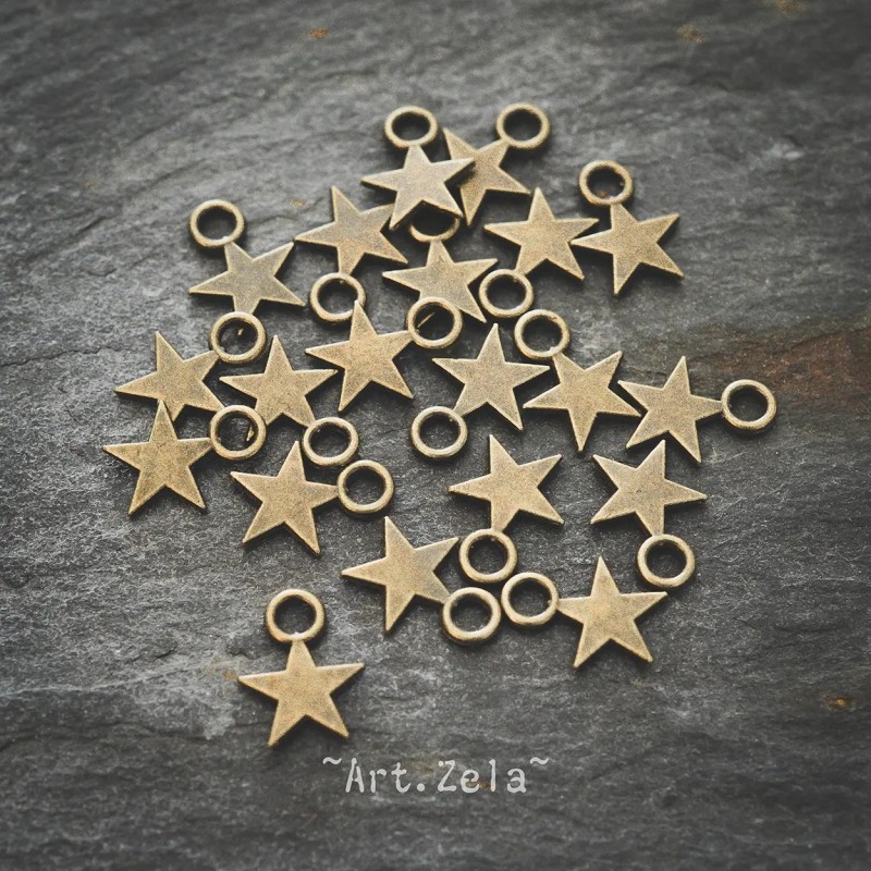 Petites étoiles 10mm X38 Breloques métal ton bronze