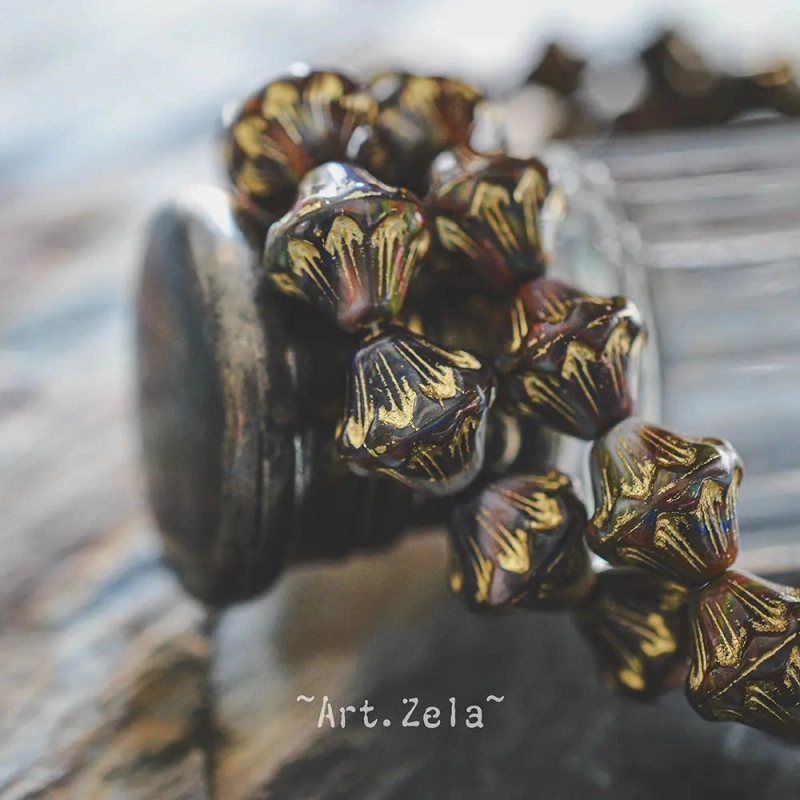 Bicones couleurs mélangées doré 11mm  X4 Perles verre tchèque opaque