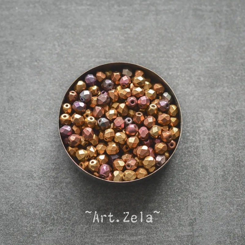 Perles facettes pourpre iris doré 4mm X40 Perles verre tchèque mat