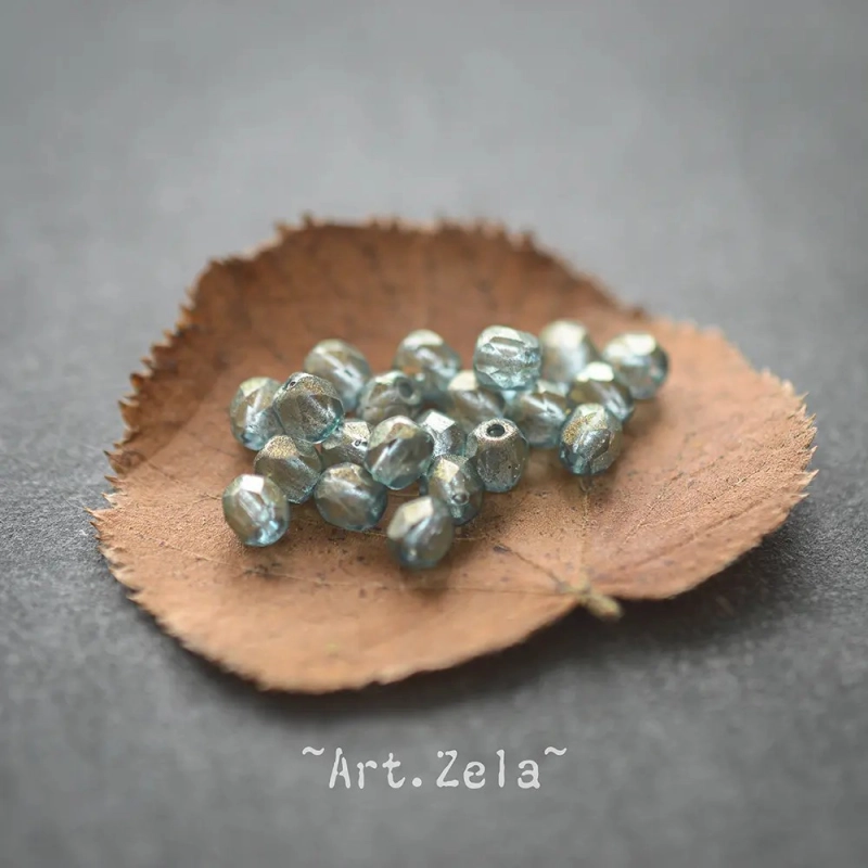 Perles facettes bleu sarcelle 4mm X40 Perles verre tchèque lustré