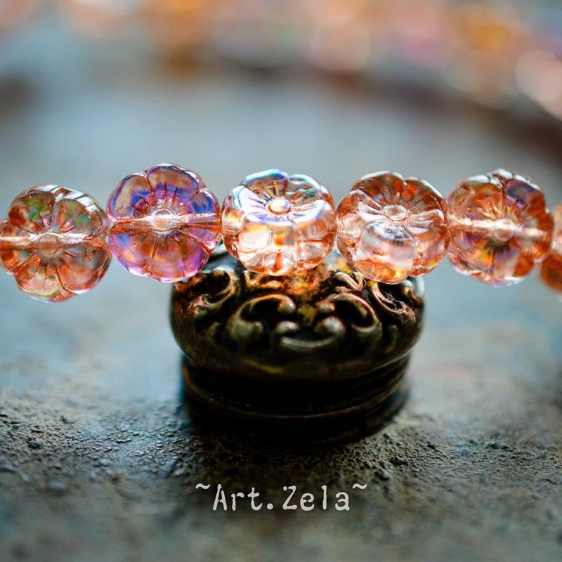 Fleurs hawaïennes orange irisé 8mm X15 Perles verre tchèque AB