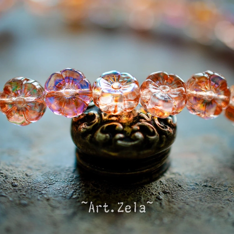 Fleurs hawaïennes orange irisé 8mm X15 Perles verre tchèque AB