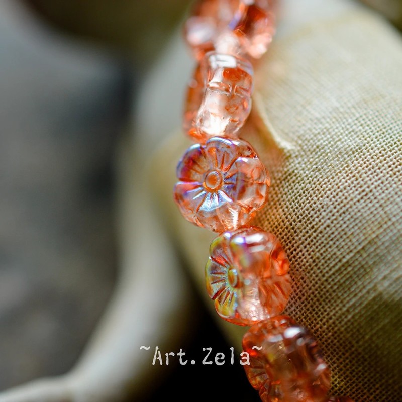 Fleurs hawaïennes orange irisé 8mm X15 Perles verre tchèque AB