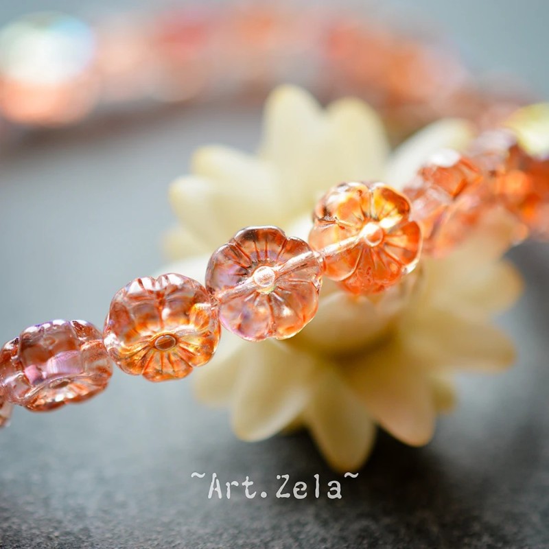 Fleurs hawaïennes orange irisé 8mm X15 Perles verre tchèque AB
