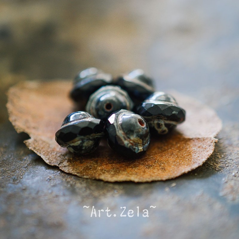 Saturne Picasso noir10x8mm X12 Perles verre tchèque opaque