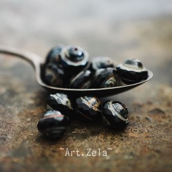Saturne Picasso noir10x8mm X12 Perles verre tchèque opaque