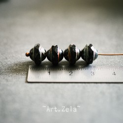Saturne Picasso noir10x8mm X12 Perles verre tchèque opaque