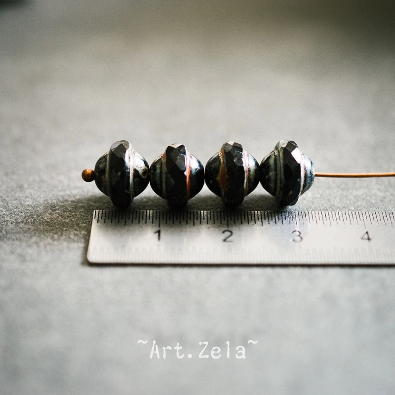 Saturne Picasso noir10x8mm X12 Perles verre tchèque opaque