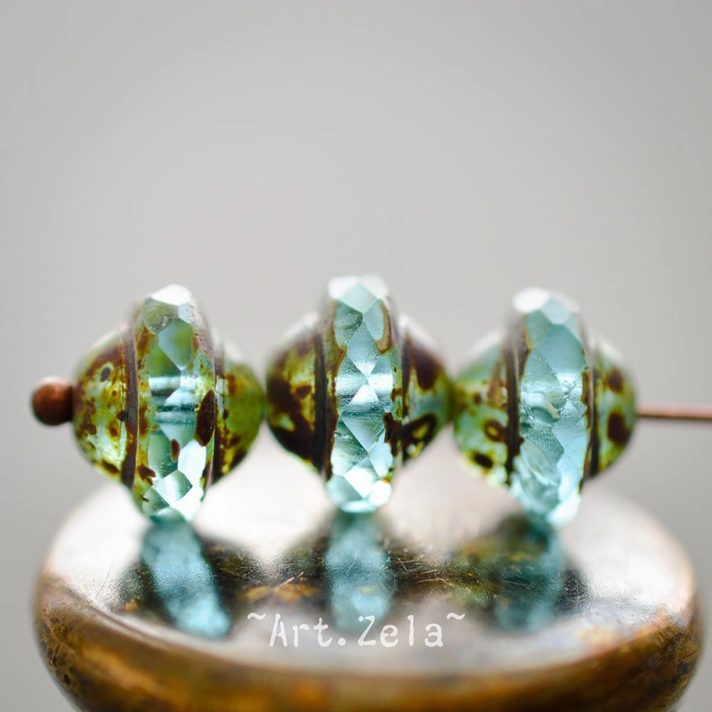 Saturne Picasso turquoise X8 Perles verre tchèque transparent