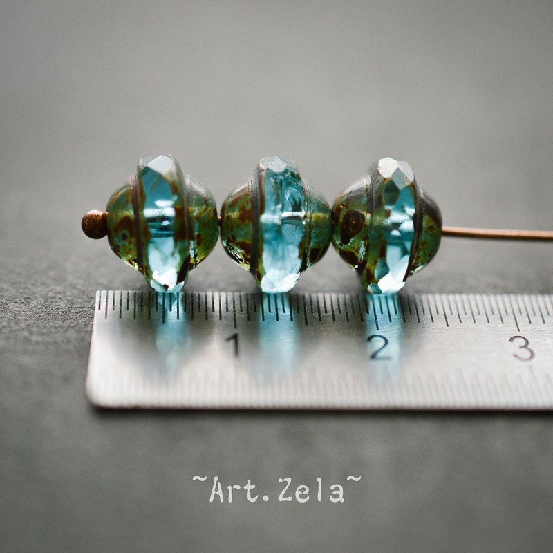 Saturne Picasso turquoise X8 Perles verre tchèque transparent