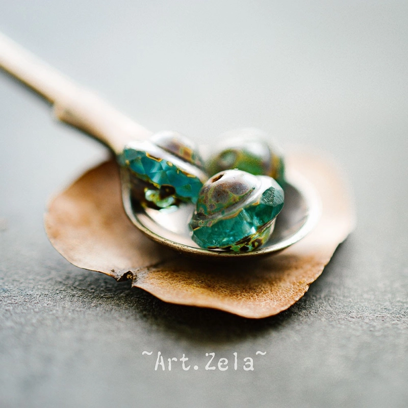 Saturne Picasso turquoise X8 Perles verre tchèque transparent