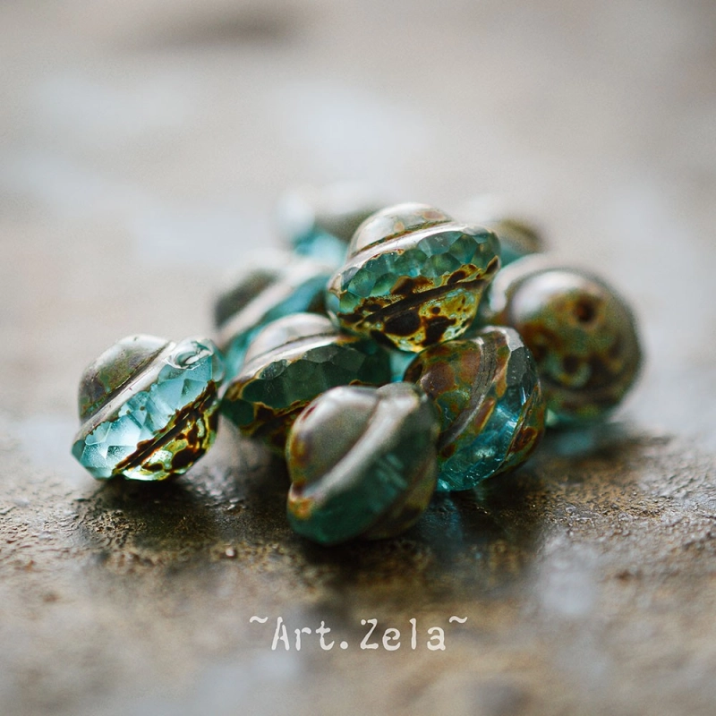 Saturne Picasso turquoise X8 Perles verre tchèque transparent