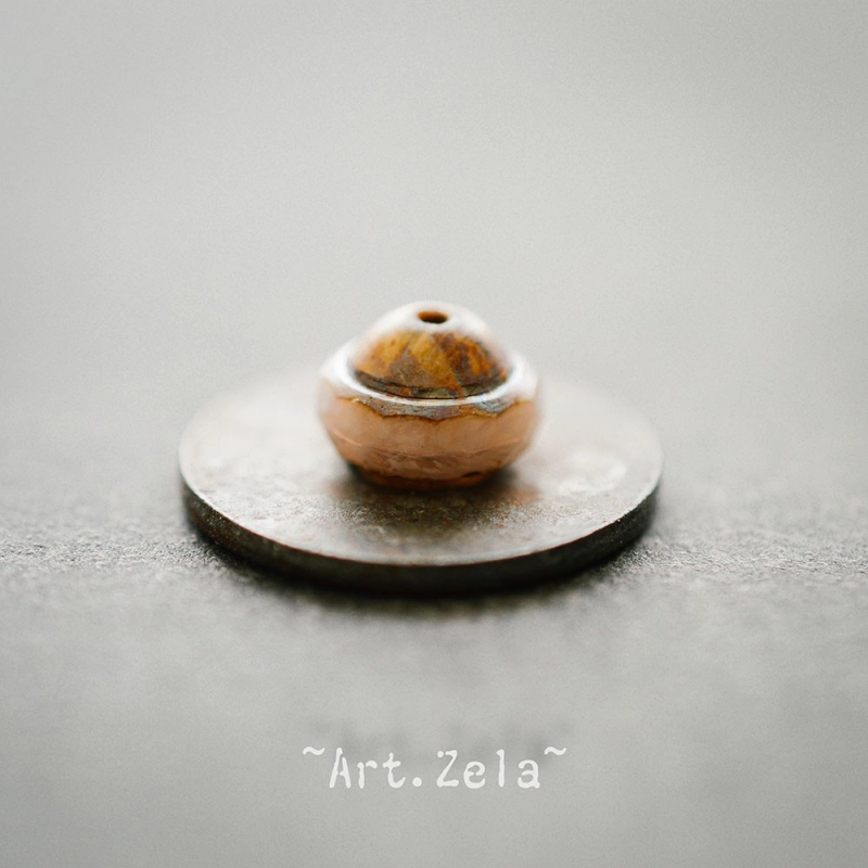 Saturne Picasso beige rosé 10x8mm X10 Perles verre tchèque