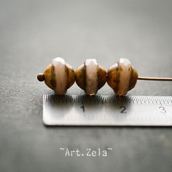 Saturne Picasso beige rosé 10x8mm X10 Perles verre tchèque