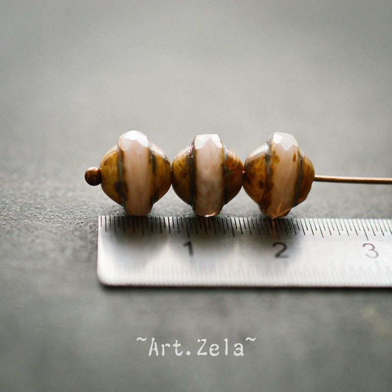 Saturne Picasso beige rosé 10x8mm X10 Perles verre tchèque