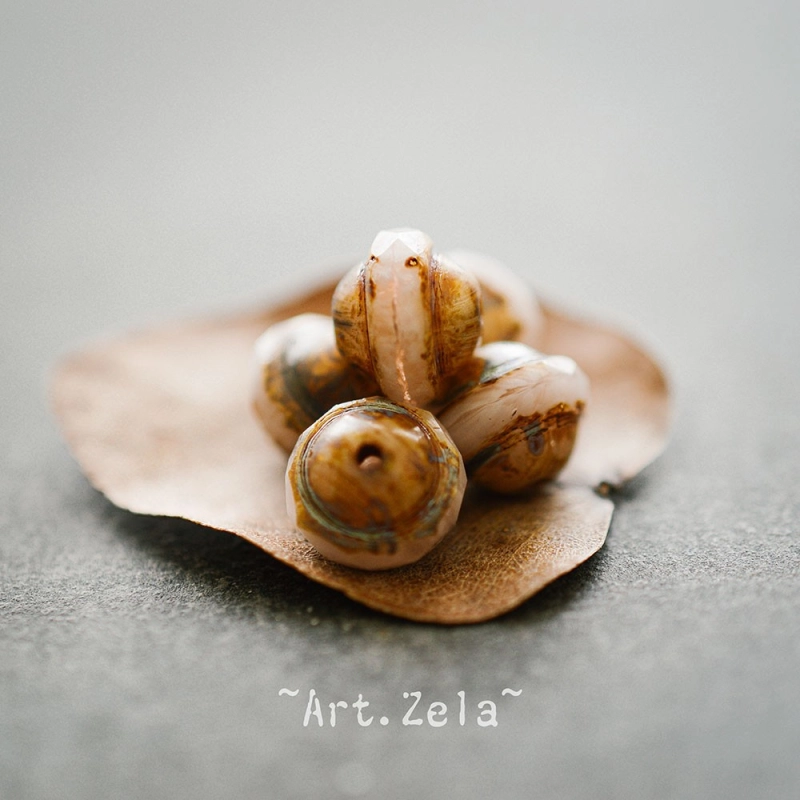 Saturne Picasso beige rosé 10x8mm X10 Perles verre tchèque