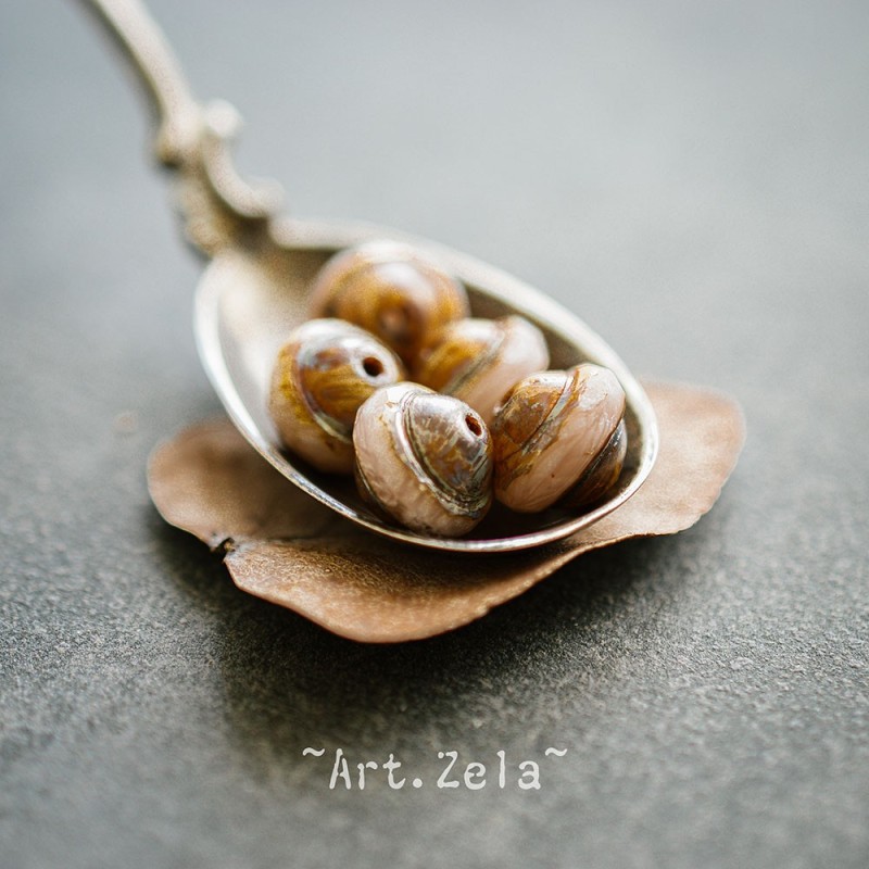 Saturne Picasso beige rosé 10x8mm X10 Perles verre tchèque
