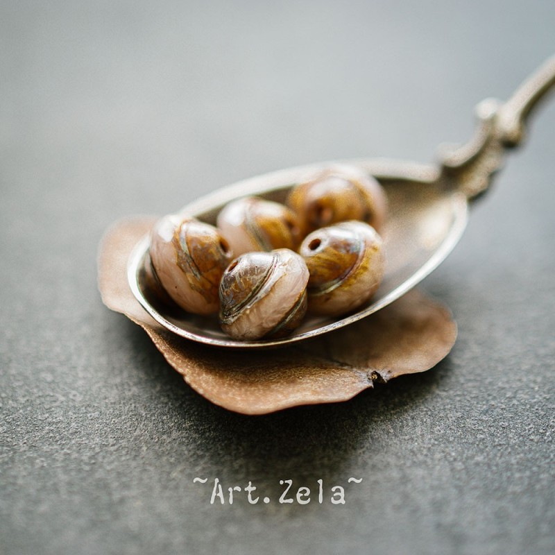 Saturne Picasso beige rosé 10x8mm X10 Perles verre tchèque