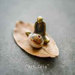 Saturne Picasso beige rosé 10x8mm X10 Perles verre tchèque