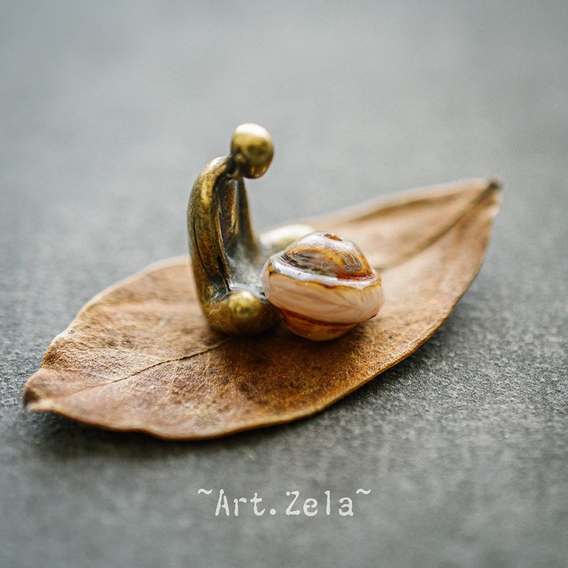 Saturne Picasso beige rosé 10x8mm X10 Perles verre tchèque