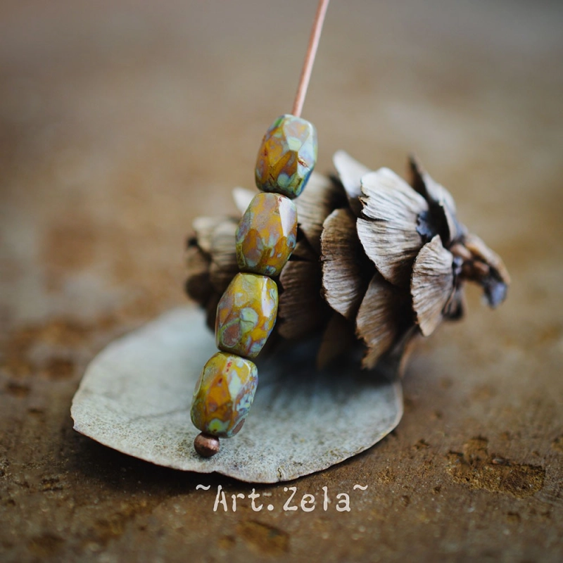 Olives facettées Picasso 7x5mm X12 Perles verre tchèque opaque