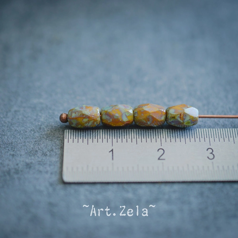 Olives facettées Picasso 7x5mm X12 Perles verre tchèque opaque