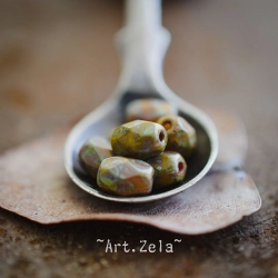 Olives facettées Picasso 7x5mm X12 Perles verre tchèque opaque