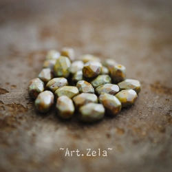 Olives facettées Picasso 7x5mm X12 Perles verre tchèque opaque