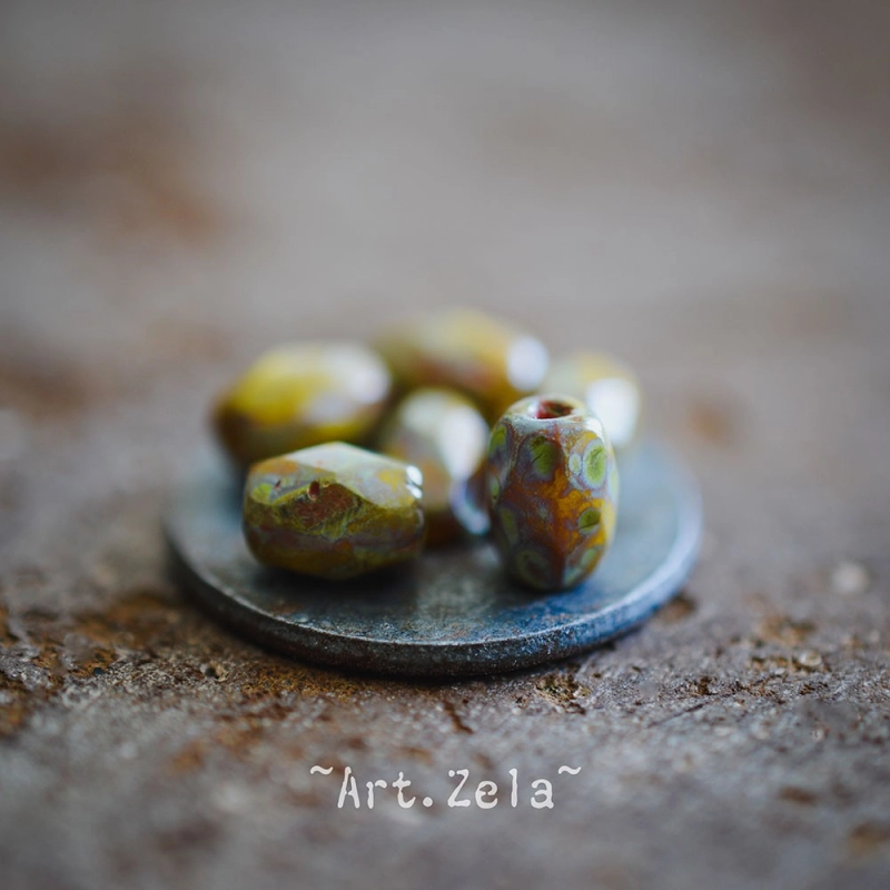 Olives facettées Picasso 7x5mm X12 Perles verre tchèque opaque